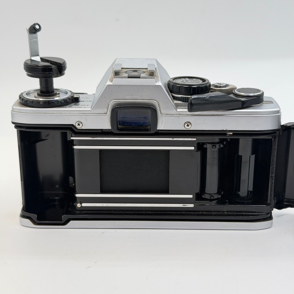 Olympus OM10 35mm Film SLR Camera Body Silver Black with Manual Adapter TESTED - Picture 9 of 12